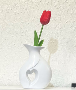 Sleek Curved Vase with Heart-Shaped Cutout